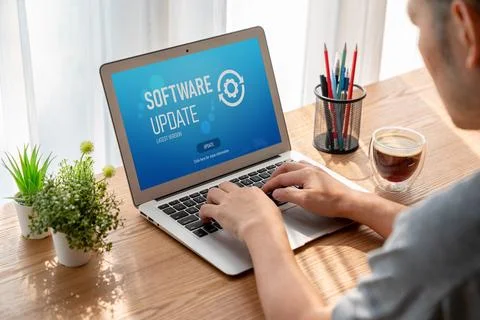 Software update on computer for modish version of device software 스톡 사진