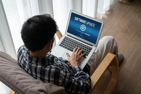 Software update on computer for modish version of device software Stock Photos