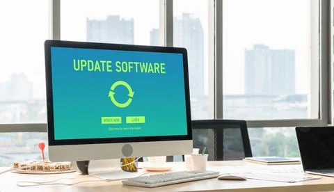 Software update on computer for modish version of device software Stock Photos