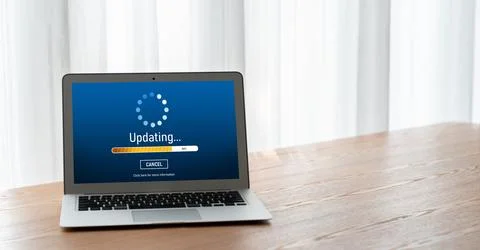 Software update on computer for modish version of device software Stock Photos