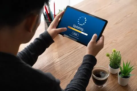 Software update on computer for modish version of device software 写真素材