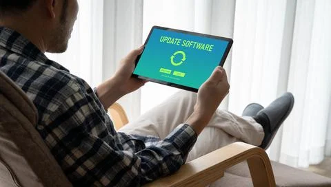 Software update on computer for modish version of device software Stock Photos