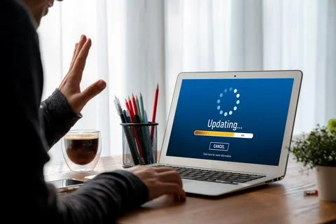 Software update on computer for modish version of device software Foto stock
