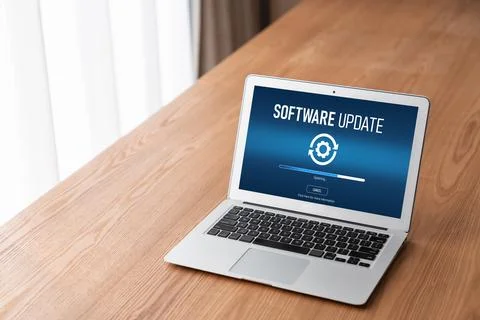 Software update on computer for modish version of device software Stock Photos