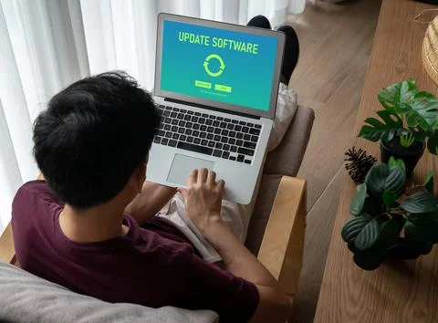 Software update on computer for modish version of device software Stock Photos