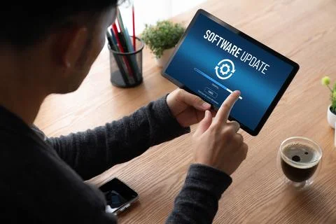 Software update on computer for modish version of device software Stock Photos
