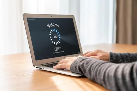 Software update on computer for modish version of device software Foto stock