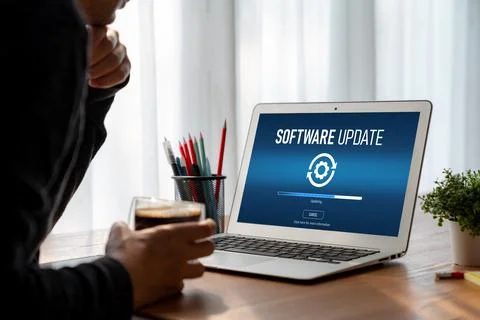 Software update on computer for modish version of device software 스톡 사진