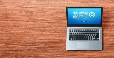 Software update on computer for modish version of device software Stock Photos