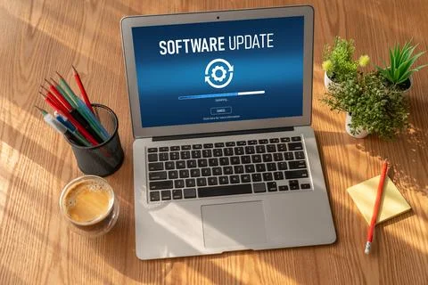 Software update on computer for modish version of device software Stock Photos