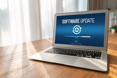 Software update on computer for modish version of device software Stock Photos