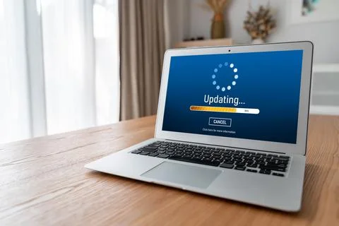 Software update on computer for modish version of device software 스톡 사진