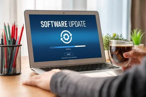 Software update on computer for modish version of device software Foto stock