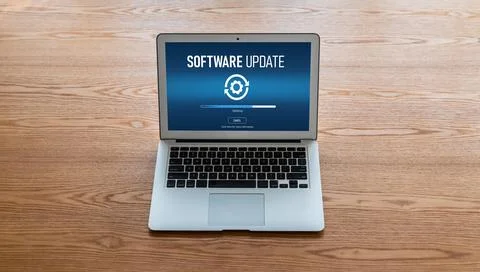 Software update on computer for modish version of device software Stock Photos
