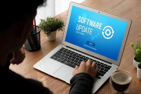 Software update on computer for modish version of device software Foto stock