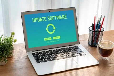 Software update on computer for modish version of device software Stock Photos