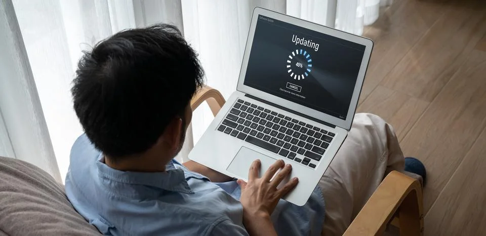 Software update on computer for modish version of device software 스톡 사진