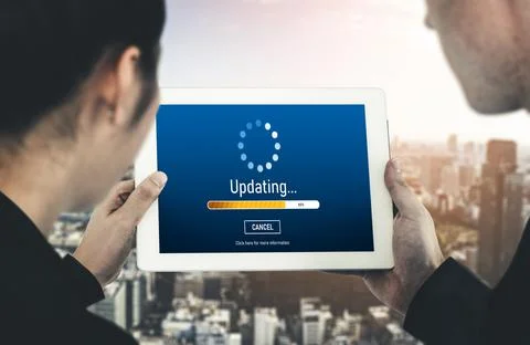 Software update on computer for modish version of device software Stock Photos