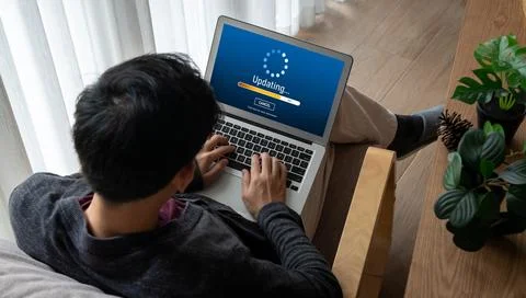 Software update on computer for modish version of device software Foto stock