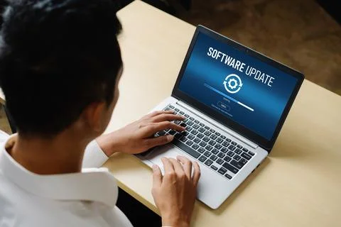 Software update on computer for modish version of device software 스톡 사진