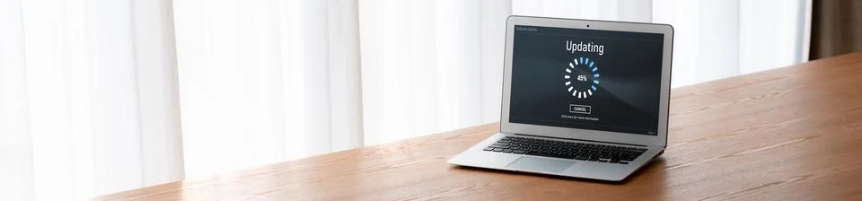 Software update on computer for modish version of device software Stock Photos