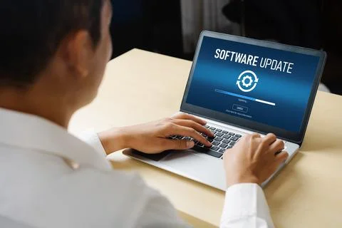 Software update on computer for modish version of device software Foto stock