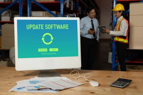 Software update on computer for modish version of device software Stock Photos