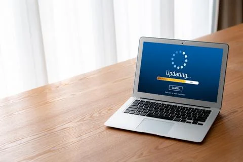 Software update on computer for modish version of device software 스톡 사진