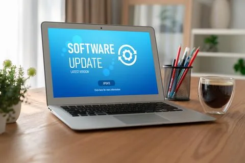 Software update on computer for modish version of device software Stock Photos
