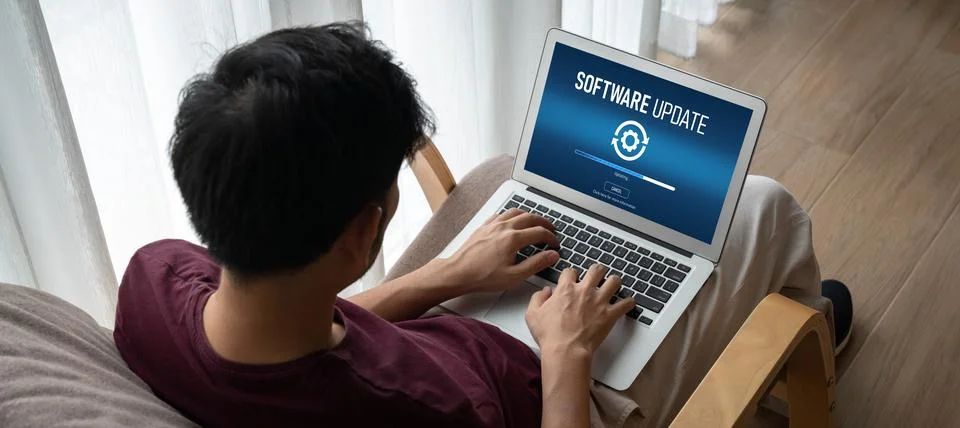 Software update on computer for modish version of device software 스톡 사진