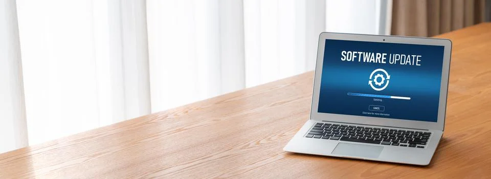 Software update on computer for modish version of device software Stock Photos