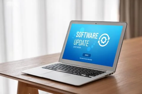 Software update on computer for modish version of device software Stock Photos