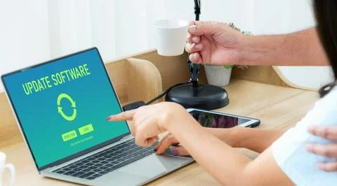 Software update on computer for modish version of device software Stock Photos