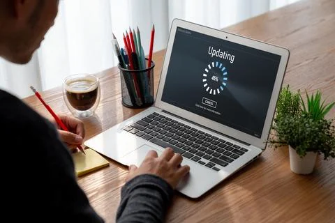 Software update on computer for modish version of device software Foto stock