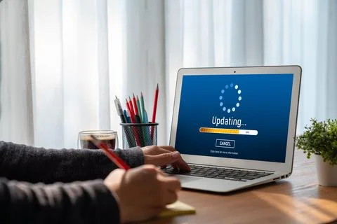Software update on computer for modish version of device software 스톡 사진