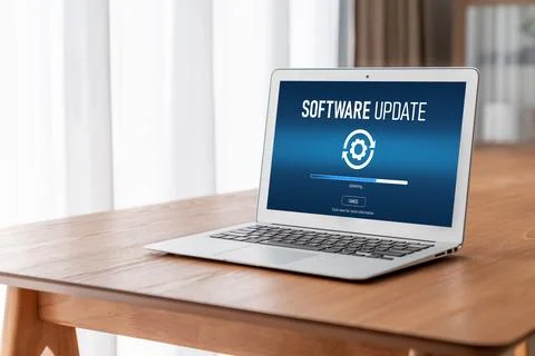 Software update on computer for modish version of device software Stock Photos