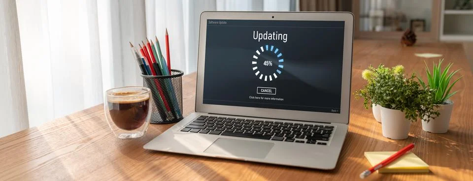 Software update on computer for modish version of device software Stockfoto's