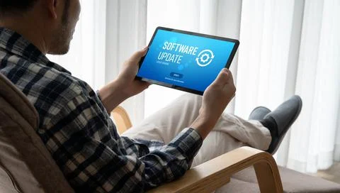 Software update on computer for modish version of device software Stock Photos