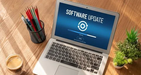 Software update on computer for modish version of device software Stock Photos