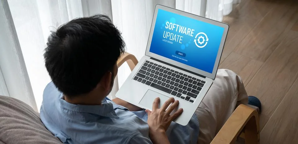 Software update on computer for modish version of device software Foto stock