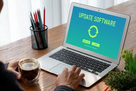 Software update on computer for modish version of device software Stock Photos