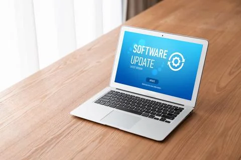 Software update on computer for modish version of device software Stockfoto's