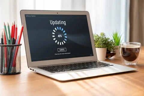 Software update on computer for modish version of device software Stock Photos