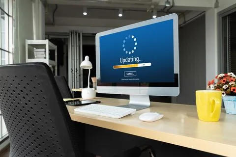 Software update on computer for modish version of device software Stockfoto's