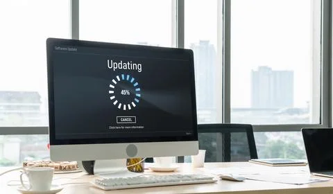 Software update on computer for modish version of device software Stock Photos