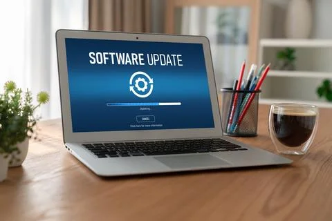 Software update on computer for modish version of device software Stock Photos