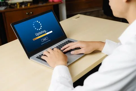 Software update on computer for modish version of device software Foto stock