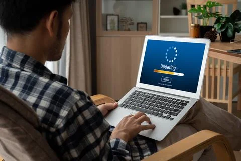 Software update on computer for modish version of device software Stock Photos