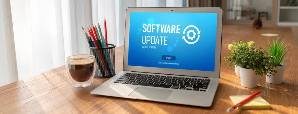 Software update on computer for modish version of device software Stock Photos