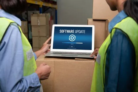 Software update on computer for modish version of device software Stock Photos